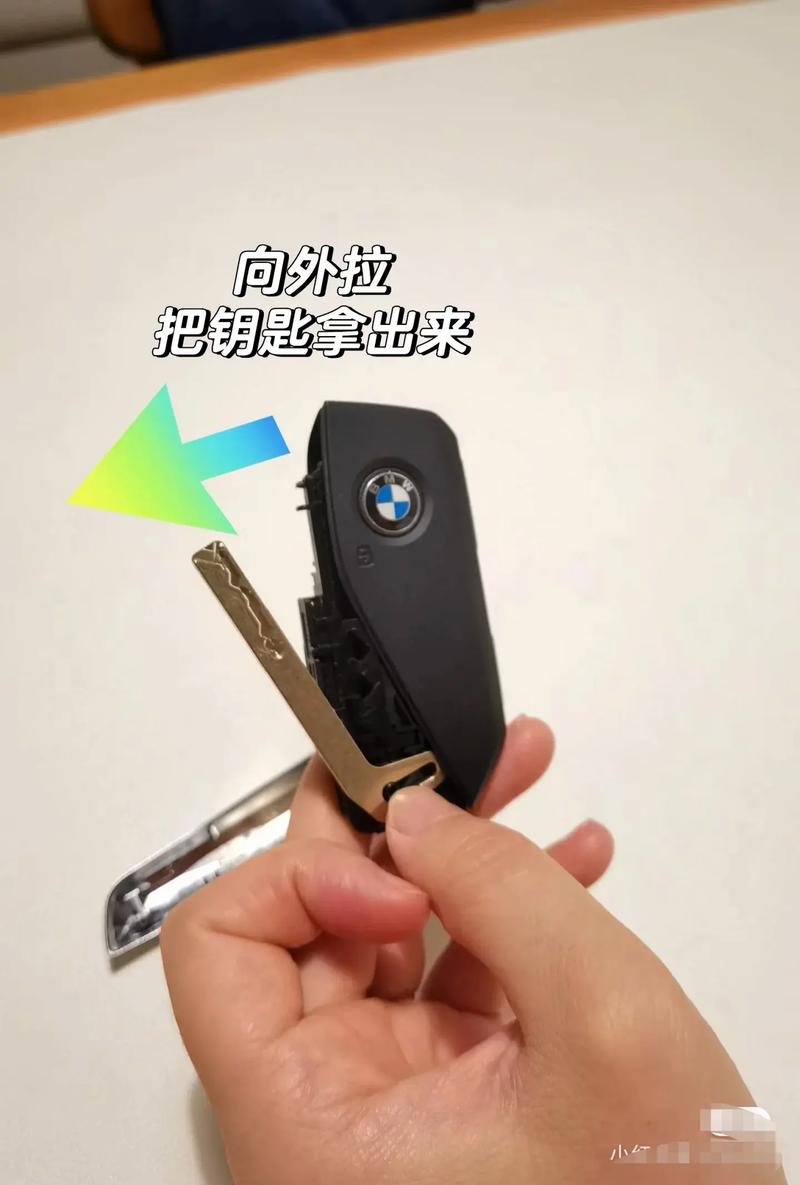 宝马车钥匙怎么换电池/宝马车钥匙怎么换电池视频没有电池盖一体的