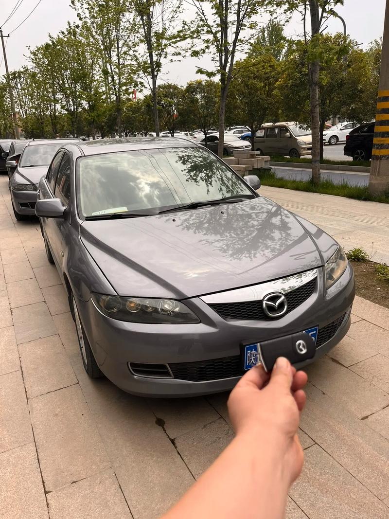 【马自达09年二手车价格,09年马自达轿跑图片】